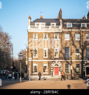 London Townhouse. The façade to a typical Georgian town house in Bedford Square in the dusk sunlight. Stock Photo