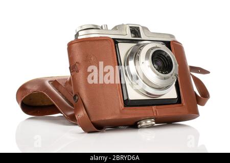 One whole vintage camera in case isolated on white background Stock Photo
