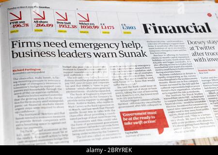 Guardian headline Financial Section 'Firms need emergency help business leaders warn Sunak' 10 March 2020 London England UK Stock Photo