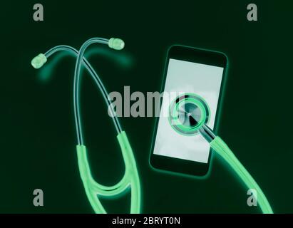 Telemedicine, stethoscope connecting to a smart phone online to connect to a healthcare professional to diagnose a health condition. Stock Photo