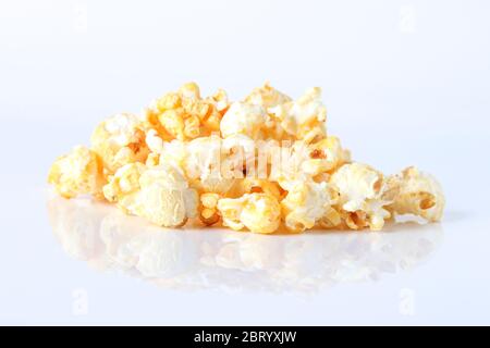 Cheese Popcorn on white background. Stock Photo