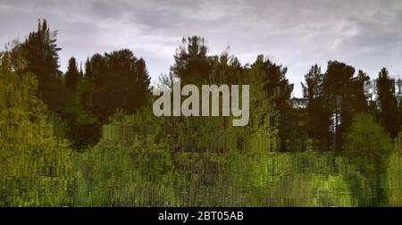 blurred abstract natural background - evening spring forest reflected in river water Stock Photo