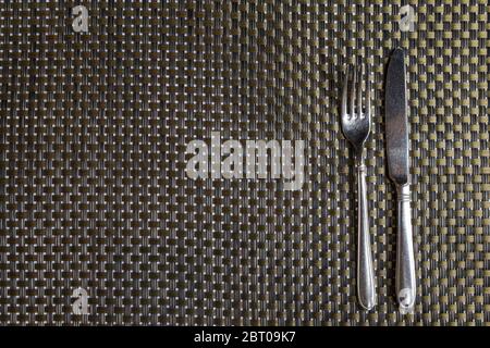 Cutlery lies on a surface in a restaurant Stock Photo