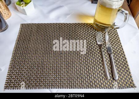 Cutlery lies on a surface in a restaurant Stock Photo