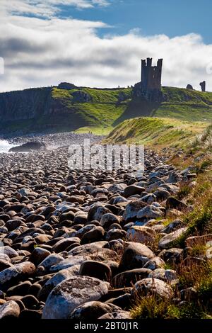 Dunstanburgh Castle from Embleton Bay, Northumberland, England Stock Photo