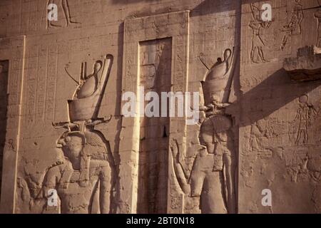 Temple of Edfu carvings on the West Bank of the Nile in Edfu, Egypt, North Africa Stock Photo