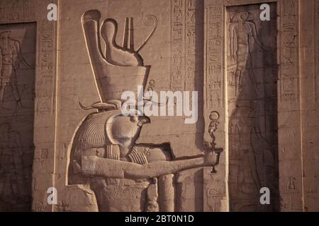 Temple of Edfu carvings on the West Bank of the Nile in Edfu, Egypt, North Africa Stock Photo