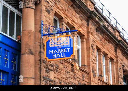 A sign for the Market Hall in Scotch Street in the town centre of Carlisle, Cumbria, England, UK Stock Photo