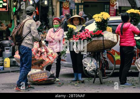 Hoi An, Vietnam - February 7, 2018 : Flower vendors in Saigon, Ho Chi Minh City, Vietnam