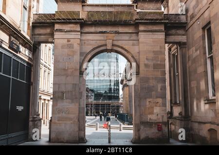The arch marking the start of the Merchant City and Royal Exchange Square in the city centre of Glasgow, Scotland Stock Photo