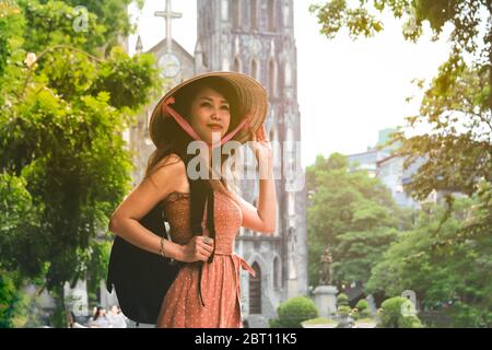 Young asian woman with backpack travelling in Hanoi Stock Photo