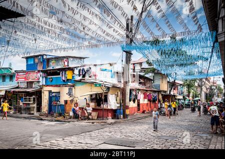 Shots of a colourful and busy road junction in the old walled city of Intramurous, Manila, The Philippines. Stock Photo