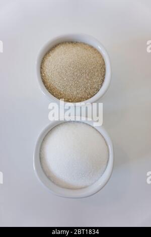 sugar cane and white sugar in sugar bowl Stock Photo