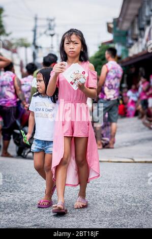 Filipino children hang out in the old walled city of Intramurous, Manila, The Philippines. Stock Photo