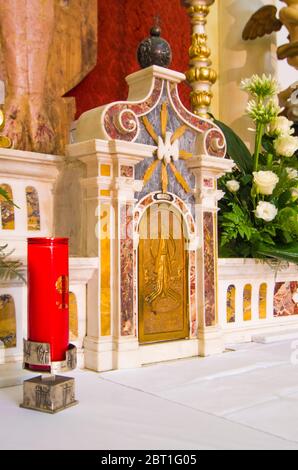 tabernacle decorated to guard the sancra ostia for Holy Mass in the old sacristy of the church Stock Photo