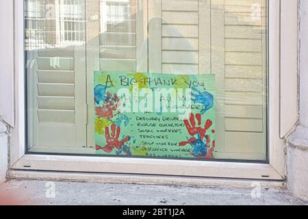 London, United Kingdom - April 29, 2020: Hand drawn poster with thank you note to NHS and essential workers displayed at house in Lewisham, during cor Stock Photo