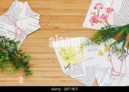 Mini paper envelopes in a woody background Stock Photo