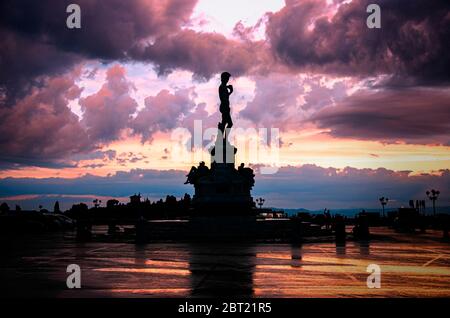 The replica of Michelangelo's David statue in Michelangelo Square during sunset in Florence, Italy Stock Photo