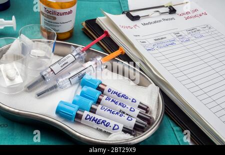 Tocilizumab and heparin medication for covid-19 patients with elevated blood dimero-D, conceptual image, unbranded generic drug containers and hypothe Stock Photo