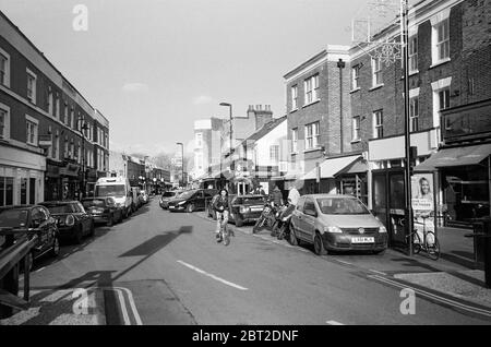 Broadway Market, London Fields, Hackney, London UK, in January, with pedestrians Stock Photo