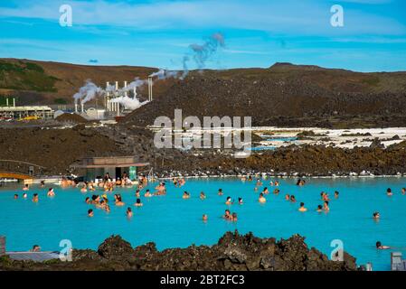 people at geothermal warm pool Blue Lagoon in Iceland Stock Photo