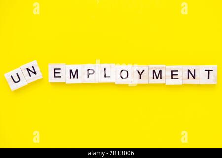 word unemployment on yellow background. Job board. Human Resource Management and Recruitment and Hiring concept Stock Photo
