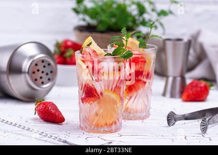 Summer strawberry lemonade with lemon Stock Photo