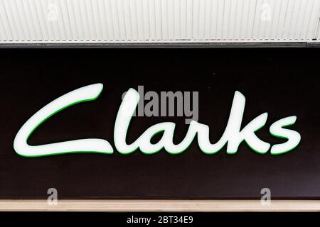 Clarks logo seen on one of their branches at Berwick Street.British-based  international shoe manufacturer and retailer C. \u0026 J. Clark international  Ltd, trading as clarks is to cut nearly 1,000 head office