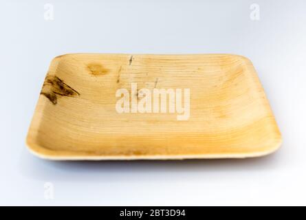 Square shaped palm leaf plate isolated on white background Stock Photo