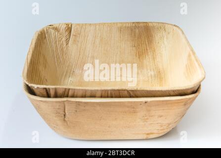 Palm leaf pressed cups isolated on white background Stock Photo
