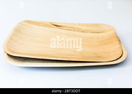 Palm leaf plates isolated on white background Stock Photo