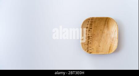 Palm leaf cup isolated on white background for banner Stock Photo