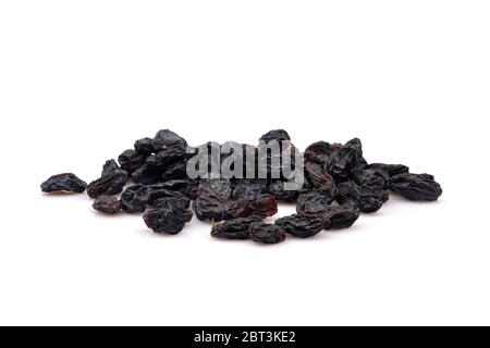 Organic Black raisin isolated on white background Stock Photo