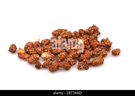 A Group Organic sauce covered peanuts on a white background Stock Photo