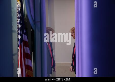 Washington, DC, USA. 22nd May, 2020. United States President Donald J. Trump arrives to a news conference in the Brady Press Briefing Room of the White House in Washington, DC, U.S., on Friday, May 22, 2020. Trump didn't wear a face mask during most of his tour of Ford Motor Co.'s ventilator facility Thursday, defying the automaker's policies and seeking to portray an image of normalcy even as American coronavirus deaths approach 100,000. Credit: Andrew Harrer/Pool via CNP | usage worldwide Credit: dpa/Alamy Live News Stock Photo