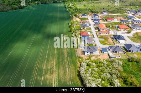 15 May 2020, Saxony-Anhalt, Bad Kösen: View of the residential area 'Seekurpark' between fields and the nature reserve 'Saale-Ilm-Platten'. (Aerial view with drone) Photo: Jan Woitas/dpa-Zentralbild/ZB Stock Photo