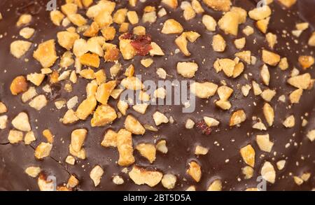Cake texture with chocolate and peanuts close up Stock Photo