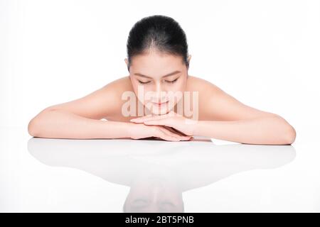 Youth and Skin Care Concept. Beauty Spa Asian Woman with perfect skin Portrait. Stock Photo