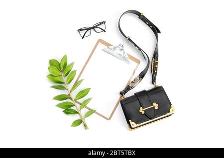 Flat lay for social media. Notepad green leaf fashion accessories on white background Stock Photo