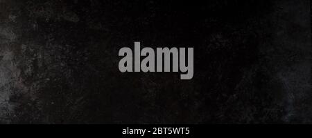 Panoramic dark metal textured. Black metal background. Stock Photo