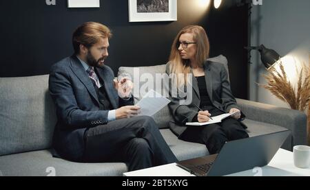 Two business people discussing ideas Stock Photo