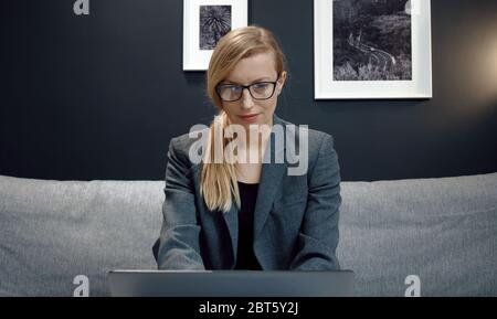 Businesswoman looking computer screen Stock Photo