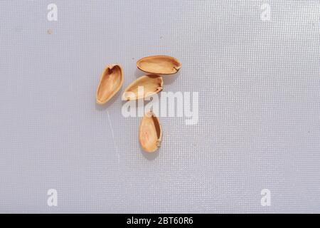Pistachios shells isolated on white background Stock Photo