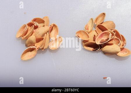 Pistachios shells isolated on white background Stock Photo