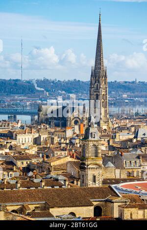 Bordeaux, Gironde Department, Aquitaine, France.    High view over rooftops to the Basilica of St Michael.The historic centre of Bordeaux is a UNESCO Stock Photo