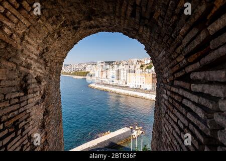 Partenope Street in the Naples Bay. Seafront view from the windows of egg castle, Castel dell'ovo, of Naples, Italy. Stock Photo