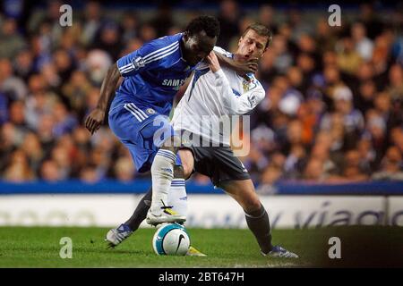 LONDON, UK APRIL 14: Chelsea's Michael Essien in action against Wigan's Ryan Taylor during Premiership League between Chelsea and Wigan Athletic at St Stock Photo