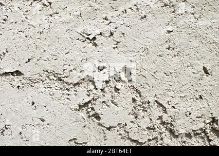 The texture of the plastered wall. Finished surface after plastering. Close-up Stock Photo
