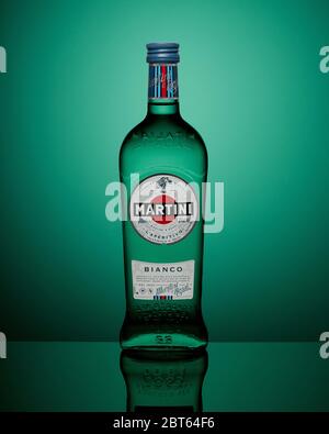 Moscow, Russia - APRIL 27, 2020: Bottle of Martini Bianco on green backdrop Stock Photo