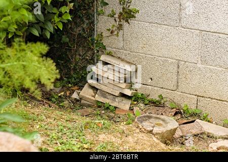 Some concrete bricks piled in the garden (Pesaro, Italy, Europe) Stock Photo